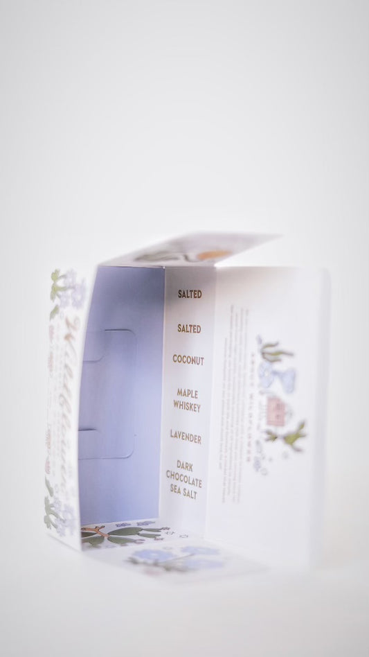 This beautifully illustrated box is the perfect intro to Wildflower Caramel Co's caramels. It includes 6 pieces of their most popular flavors - Salted (2 pcs), Coconut, Maple Whiskey, Honey Lavender, Dark Chocolate + Sea Salt.