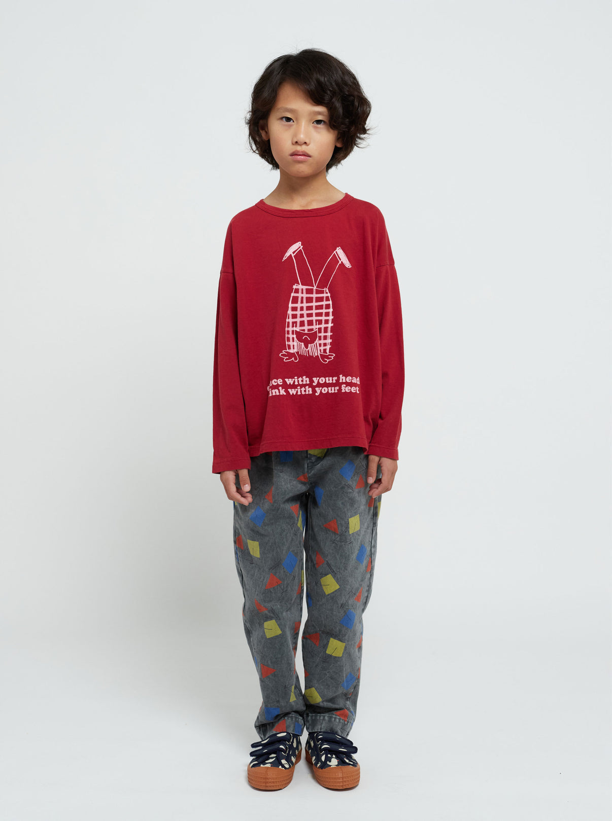 Headstand Child long sleeve t-shirt by Bobo Choses! 100% organic cotton burgundy red long sleeve t-shirt. Designed with long sleeves and round neck. It has a loose fit. Made in Spain.