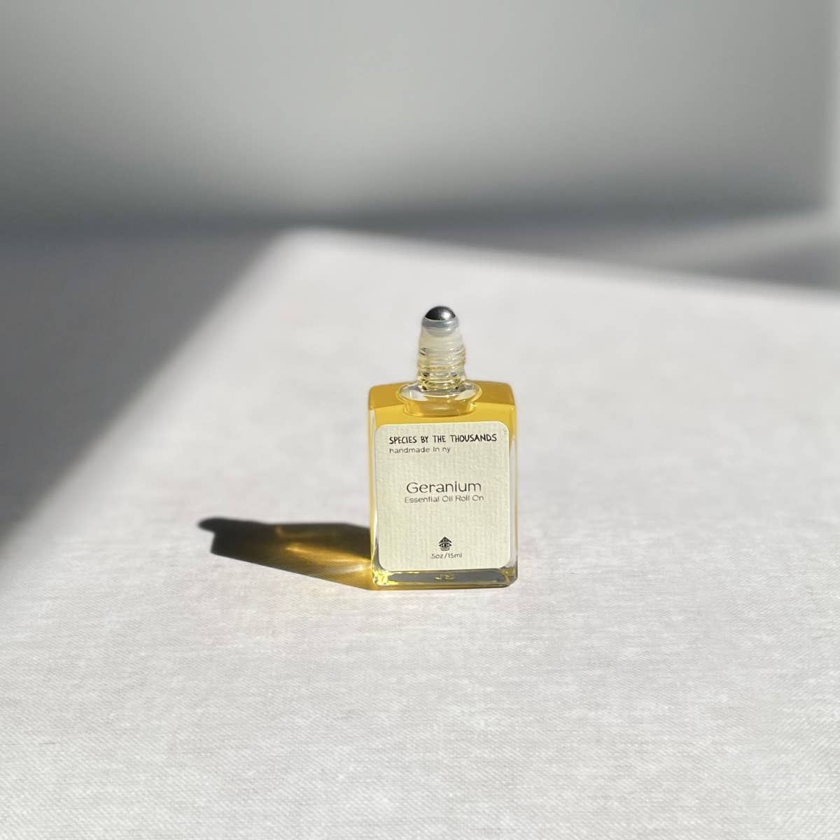 This geranium oil blend has a leafy green aroma with a rosy dry down. roll it on as an aromatherapy or natural alternative to perfume.