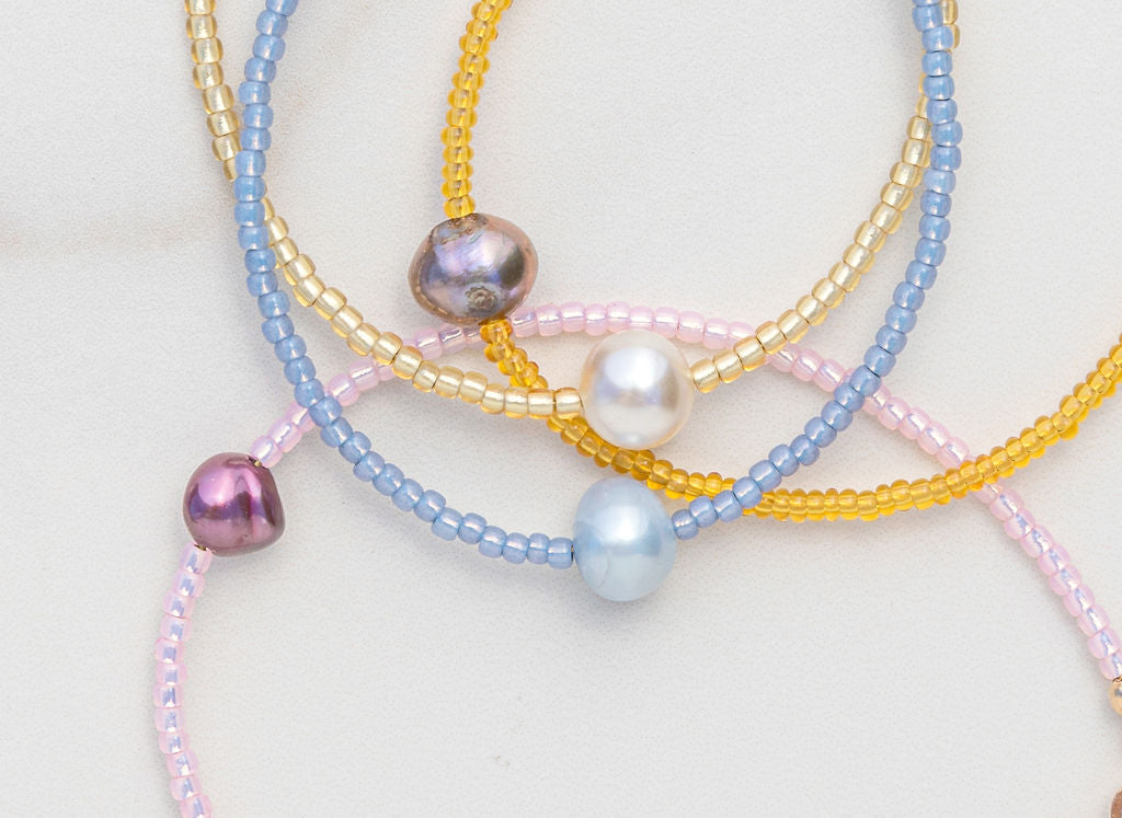 7" 14k gold fill bracelet featuring Japanese glass beads and a pearl, completely one-of-a-kind and handmade by Punkwasp. Made locally in San Diego, California.