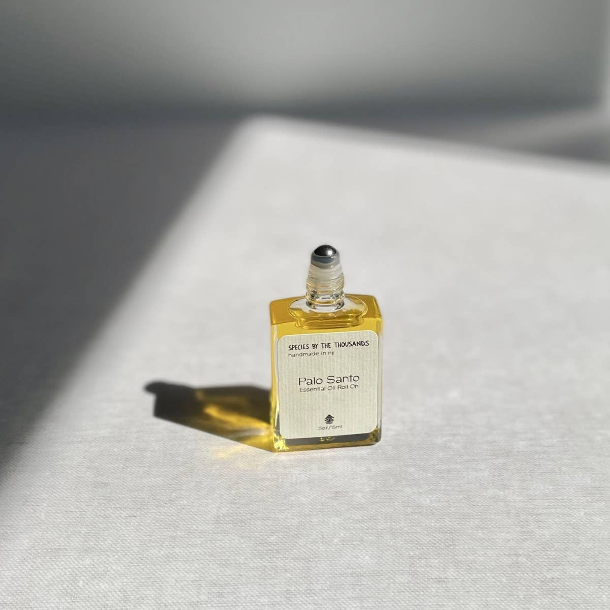 This palo santo oil blend has a woody, slightly fruity, balsamic, and citrus scent. Roll it on as an aromatherapy or natural alternative to perfume.