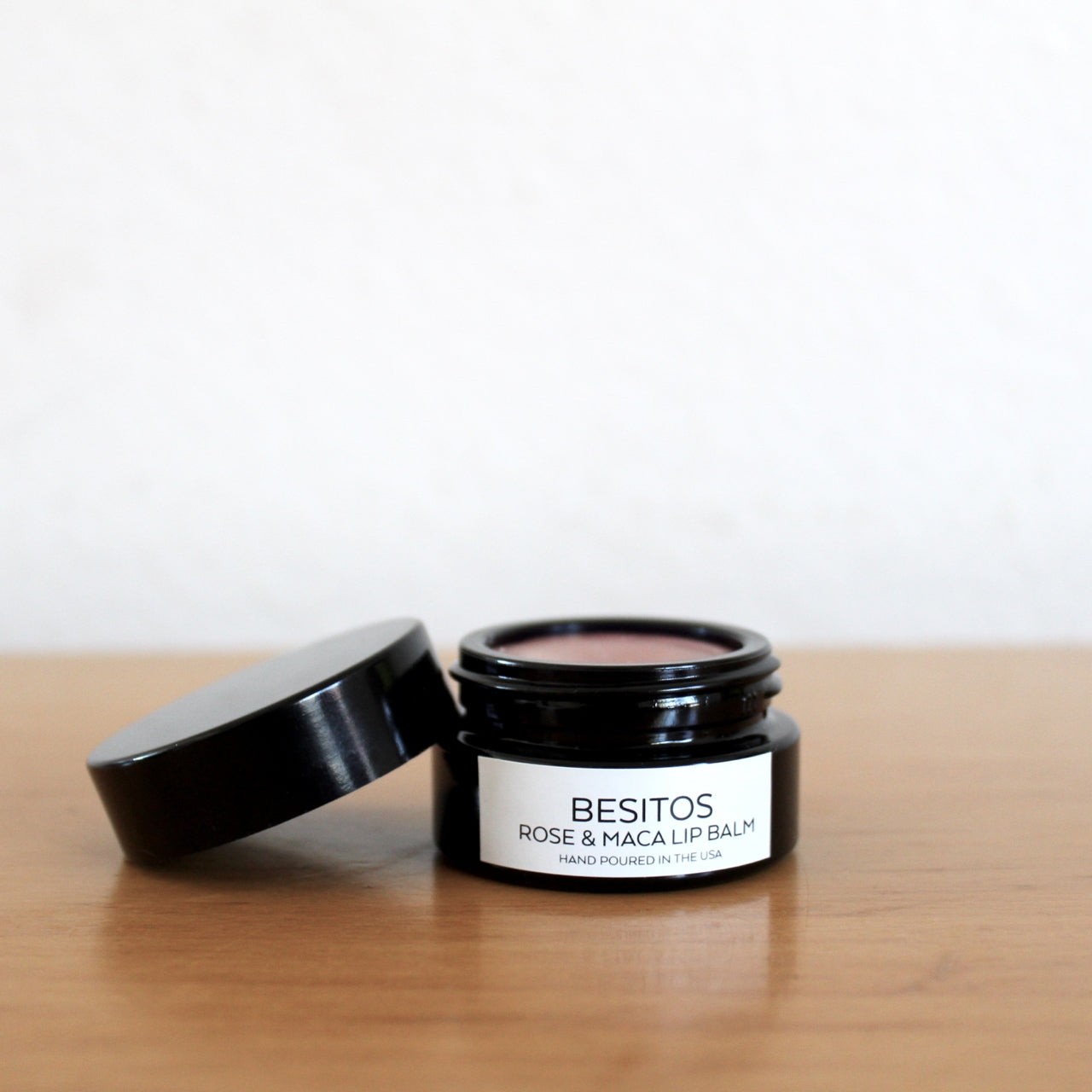 Lip balm for the natural sophisticate. Besitos translates to "little kisses" in Spanish and with ingredients like maca root and rose, it is a gift to yourself with each wear. Lightly scented with spearmint and rose and sweet organic vanilla absolute. Hand poured in California.