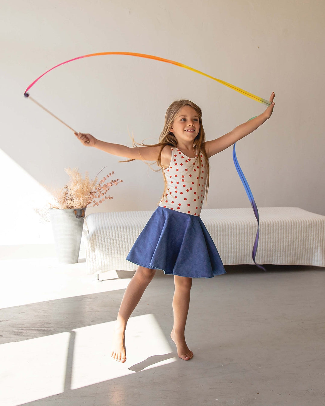 Streamers encourage children to play actively, increase their quality of movement, and make them want to dance! Some pretend play ideas include waving in the wind, writing letters in the air, pretend fishing, dancing, and more. A wooden sticker with a strip of rainbow made from gorgeous, lightweight 100% pure silk.