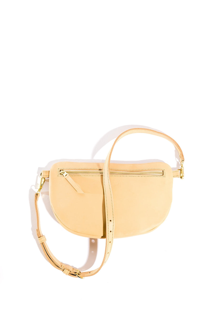 The best-selling Sling Bag is now available in a bigger size. Still sleek, lightweight, and chic, now you'll be able to add that *one* extra thing. Your large wallet, glasses case, or even a small book will fit inside the Big Sling. Fair trade and adjustable leather sling bag/fanny pack.