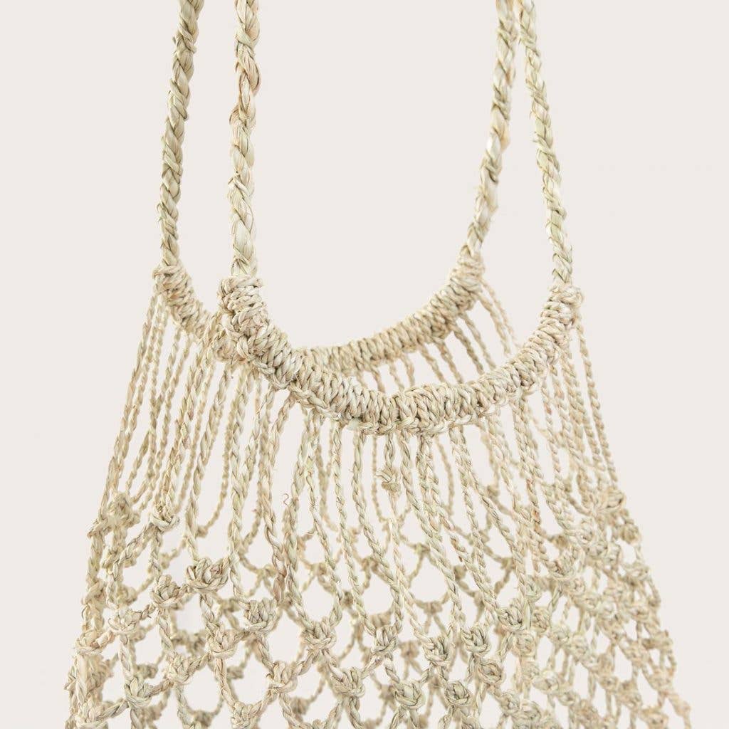 Handwoven from chupon in Patagonia, Chile by two women artisans. We love to use this bag for a day at the beach or a trip to the farmers market, or even as decor in the home.