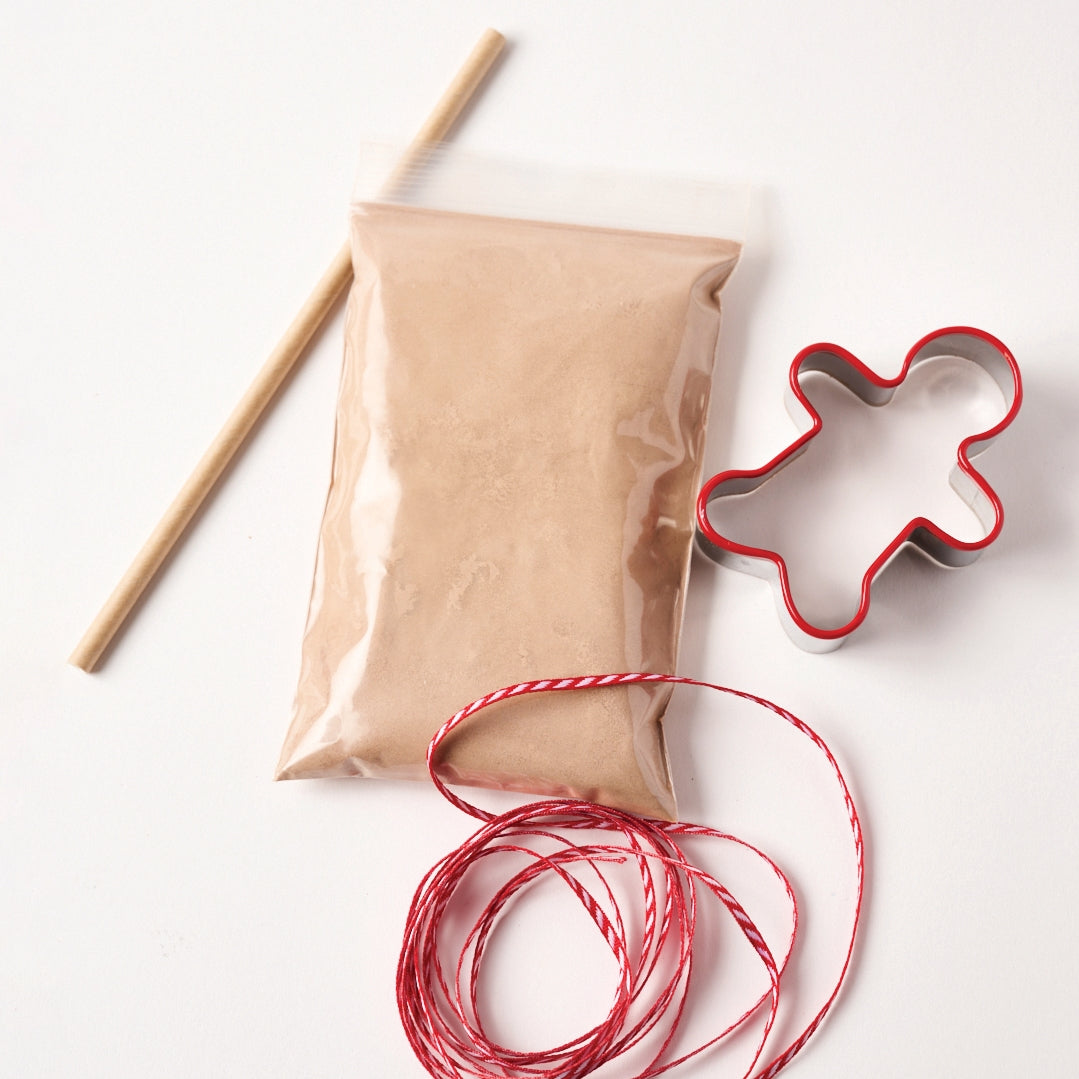 Create everlasting, fragrant gingerbread ornament with our all-natural salt dough mix! Easy to make, just add water, roll, cut and bake! Kit includes: Powdered dough mix (with e all-natural spices in our powdered salt-dough recipe), a gingerbread cookie cutter, a straw hole punch and ribbon.