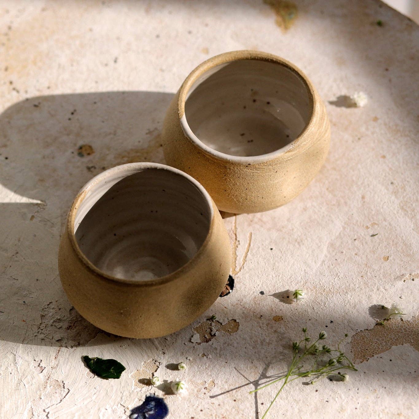 good hearted woman dune groove cup / The perfect lil cup for whisky, mezcal, coffee, and wine. Featuring thumb print nooks making holding extra cozy. Raw stoneware with a glazed interior. Handmade in Denver, CO.