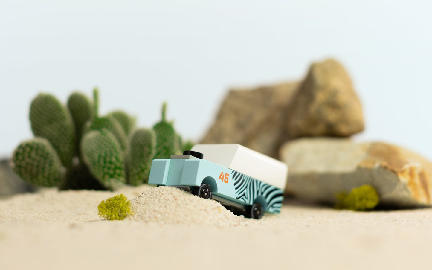 Mini Zebra Drifter toy car by Candylab Toys features solid beech wood and water-based paints. Made sustainably, made to last, made for fun. Wood, soy inks, water-based paints, degradable rubber, and metal parts are all part of Candylab's old school way of making toys, with a modern design twist.