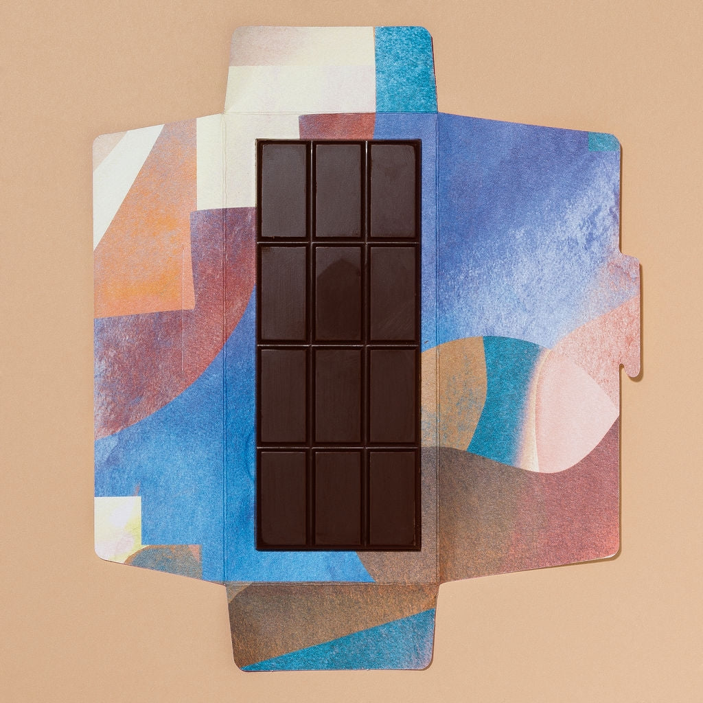 Heirloom chocolate bar with tasting notes of chocolate malt, candied lemon, and hojicha latte.