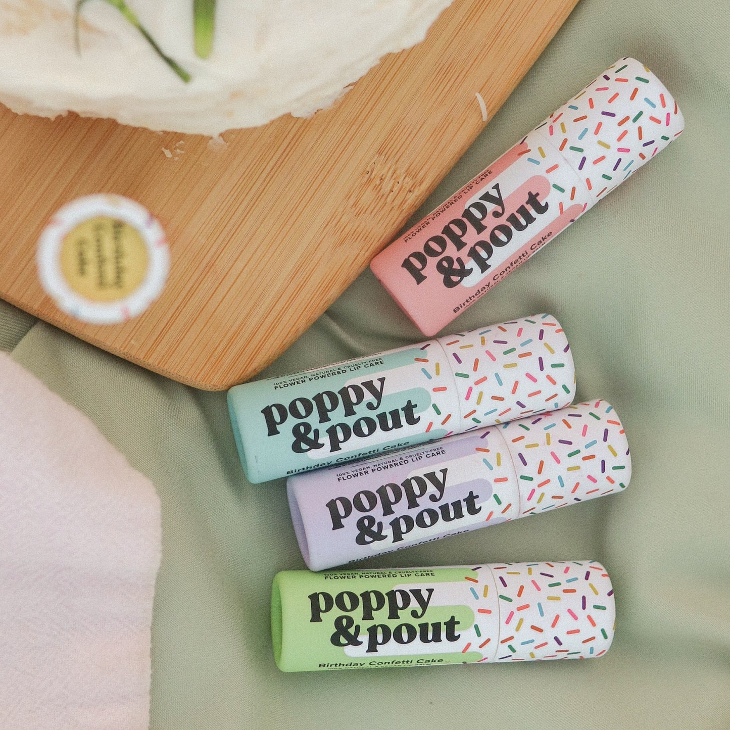 This birthday-inspired lip balm smells like vanilla cake with sweet, subtle notes of raspberry. Super smooth vegan formula uses 100% natural ingredients like sunflower wax to keep your lips hydrated all day long!