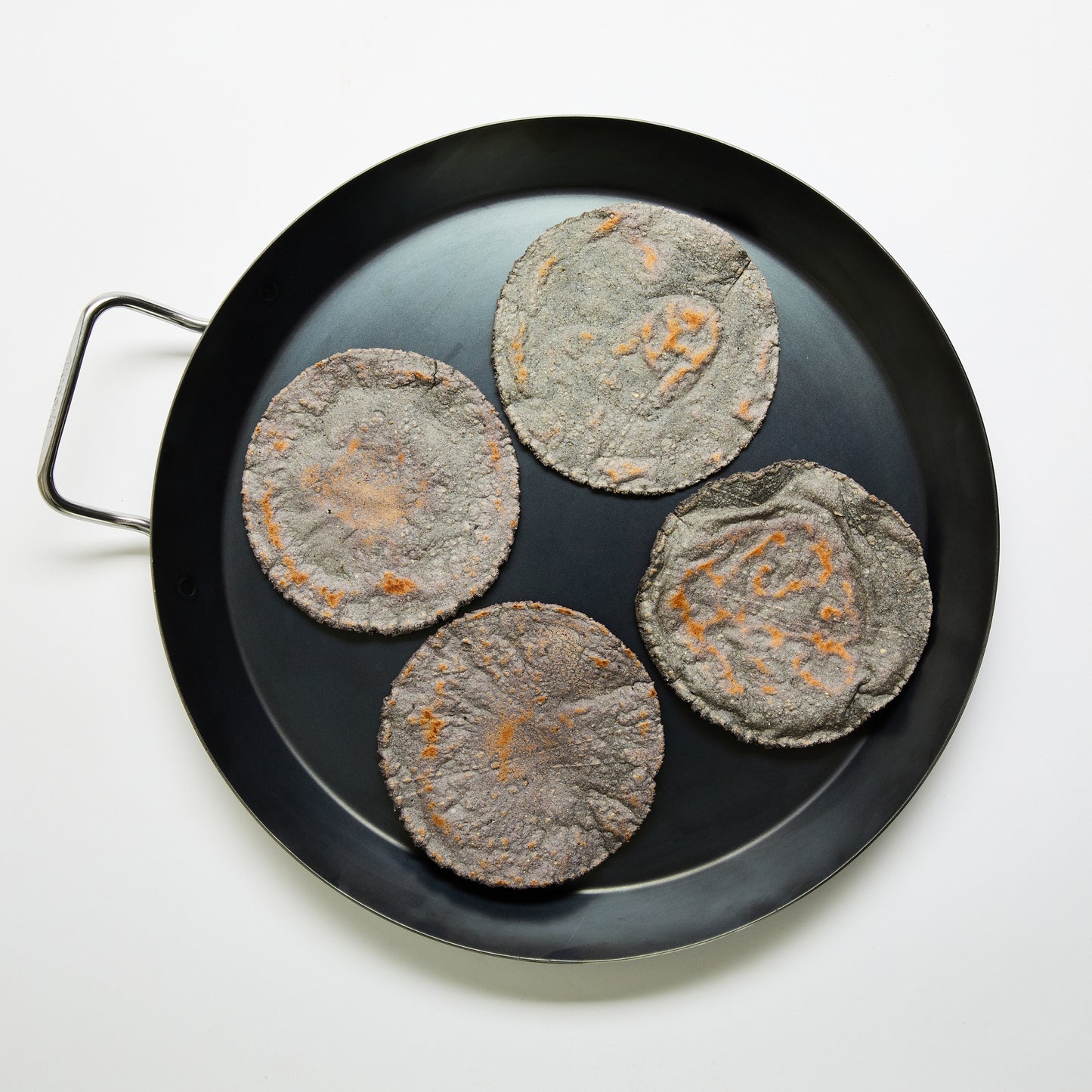 Masienda's best-selling Heirloom Blue Corn Masa Harina is a fine-ground nixtamalized corn flour. Its deep flavor comes from high quality heirloom corn, which is cooked, slow dried and milled to perfection in small batches. Never genetically modified. Always gluten-free.
