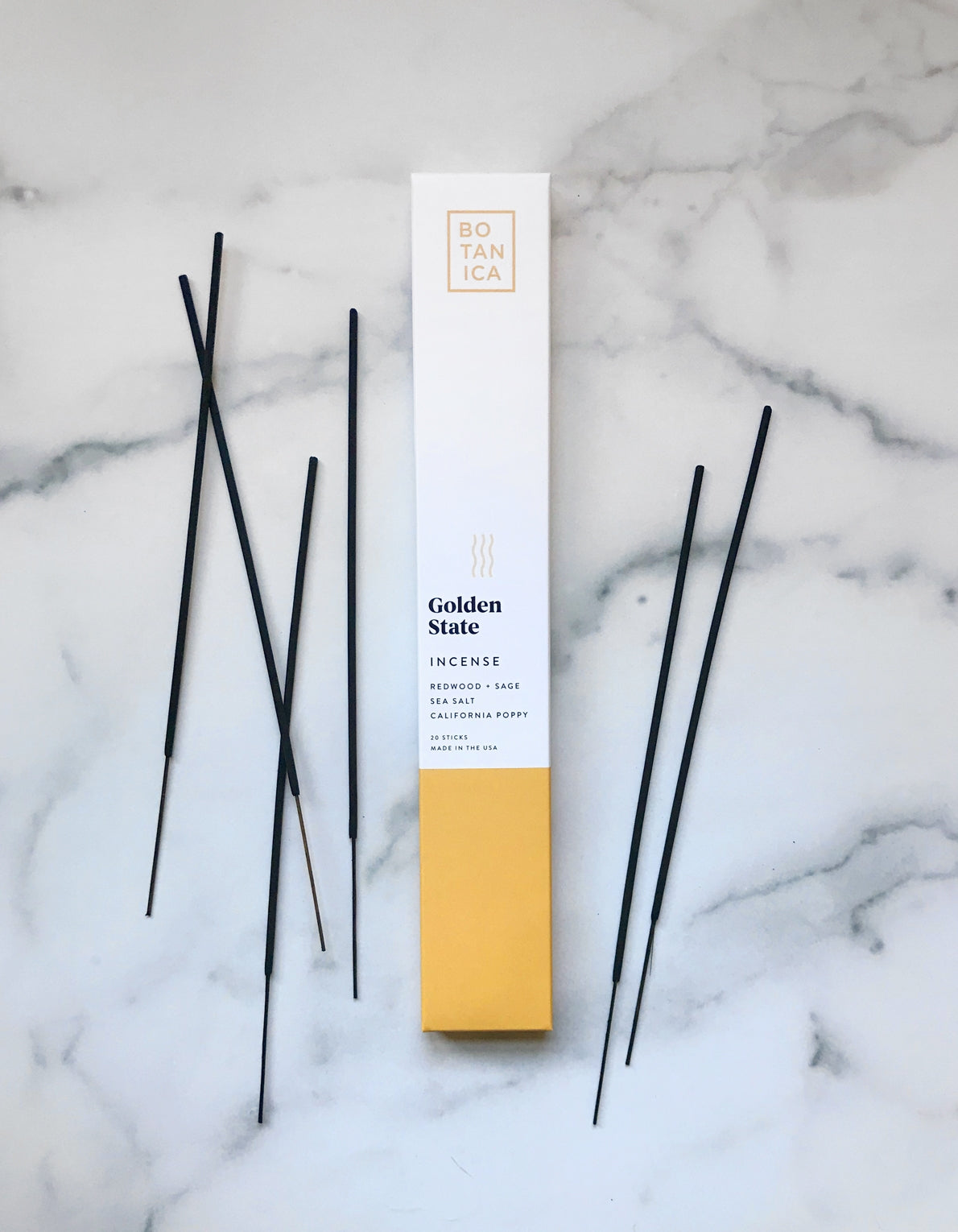 botanica golden state incense. Made with high-quality fragrance blends, plus essential oils for a long, balanced ritualistic experience–sure to make any dwelling feel like a luxurious retreat. Scent notes of California poppy, redwood, sage, and sea salt.