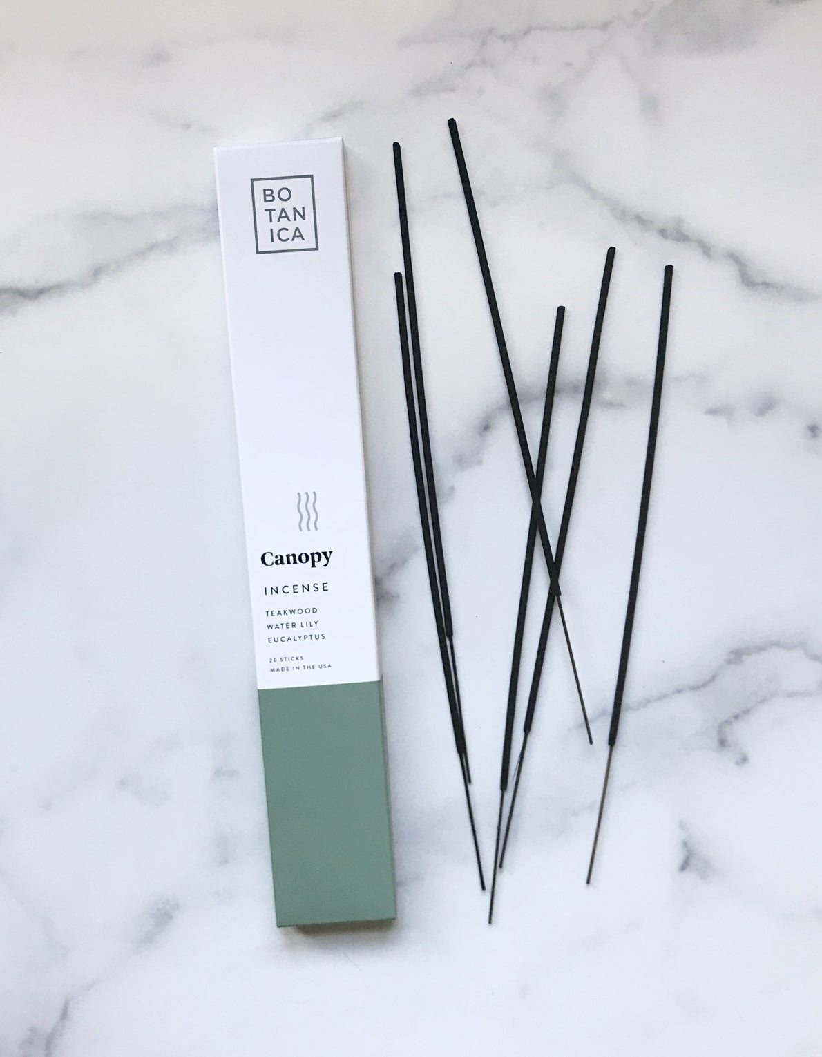 botanica canopy incense. Made with high-quality fragrance blends, plus essential oils for a long, balanced ritualistic experience–sure to make any dwelling feel like a luxurious retreat. Scent notes of teakwood, water lily, and eucalyptus.