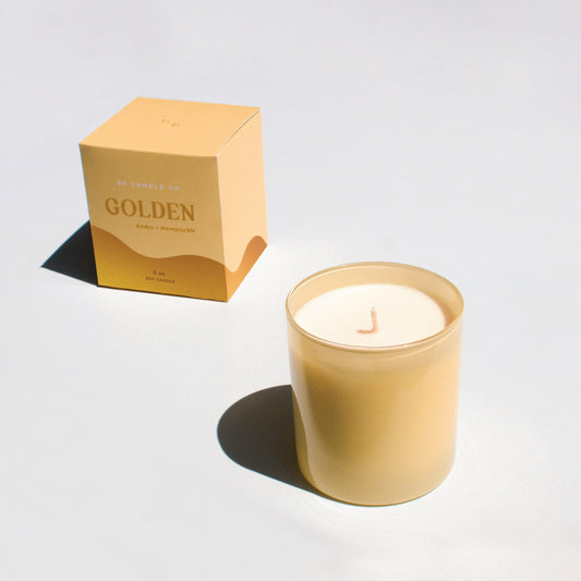 Golden features notes of mandarin, sweet honeysuckle, gardenia and sandalwood.
Hand-poured in small batches with soy wax, premium fragrance, and cotton wicks.
Vegan, free of phthalates and parabens, and cruelty-free.