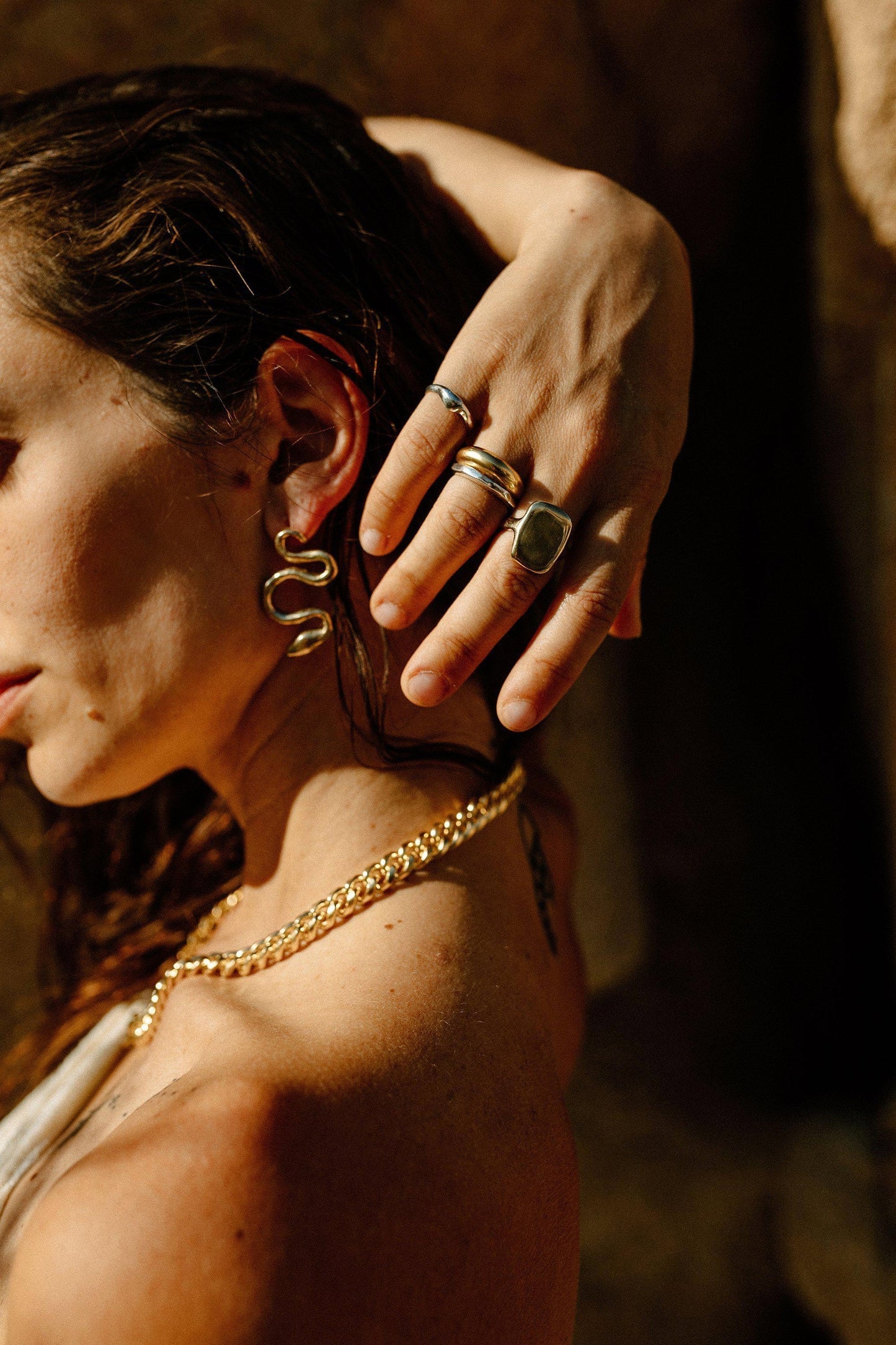 An often maligned species, we find beauty in the powerful serpent. Asymmetrical snake earrings available in brass and sterling silver. All Dea Dia pieces are proudly designed and handmade in Downtown Los Angeles.