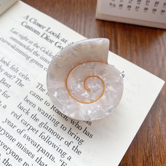 1.5" seashell hair clip - Made with eco-friendly cellulose acetate that is both durable and comfortable.