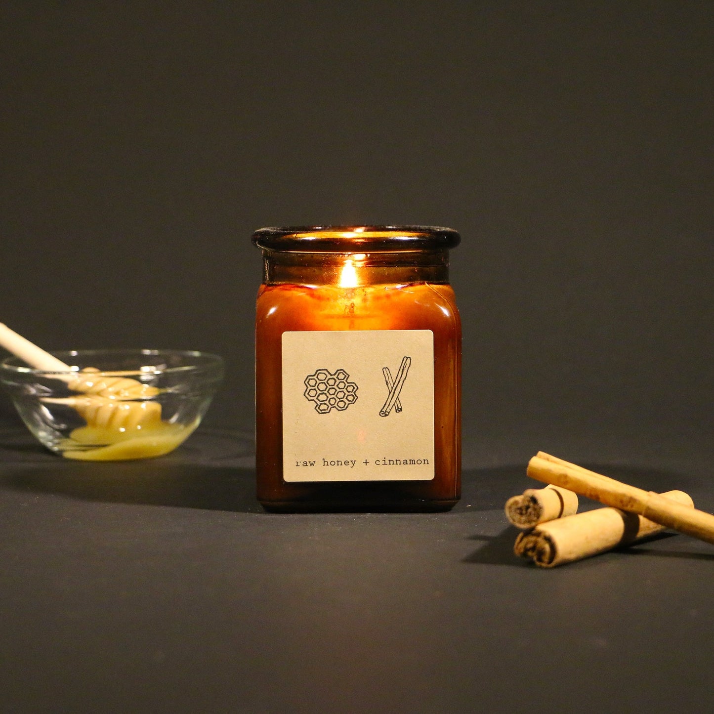 Moonrise candle co / Melt into the bright scent of honey with a kick of clove and cinnamon.