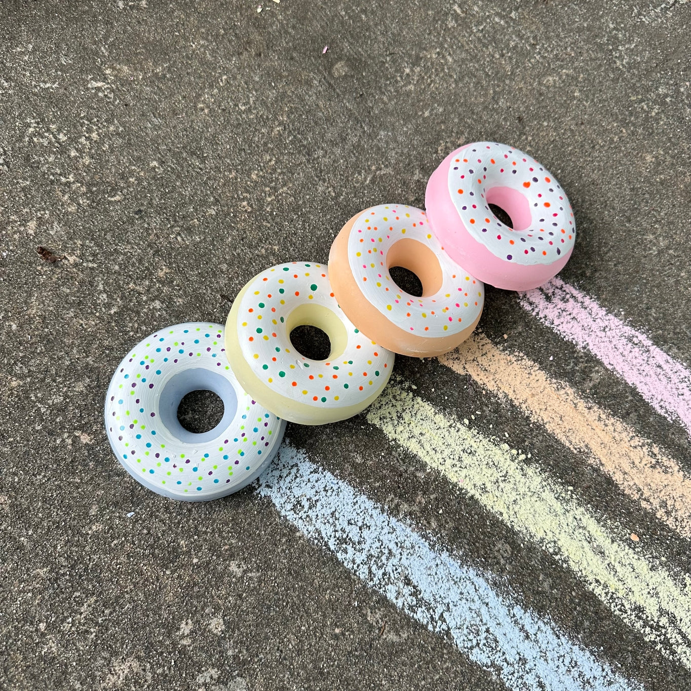 Grab one of these hand painted donuts for outdoor fun this season! With acrylic paint on top of vibrant colored chalk, you are sure to create something unique and special! Eco-friendly, non-toxic, washable.