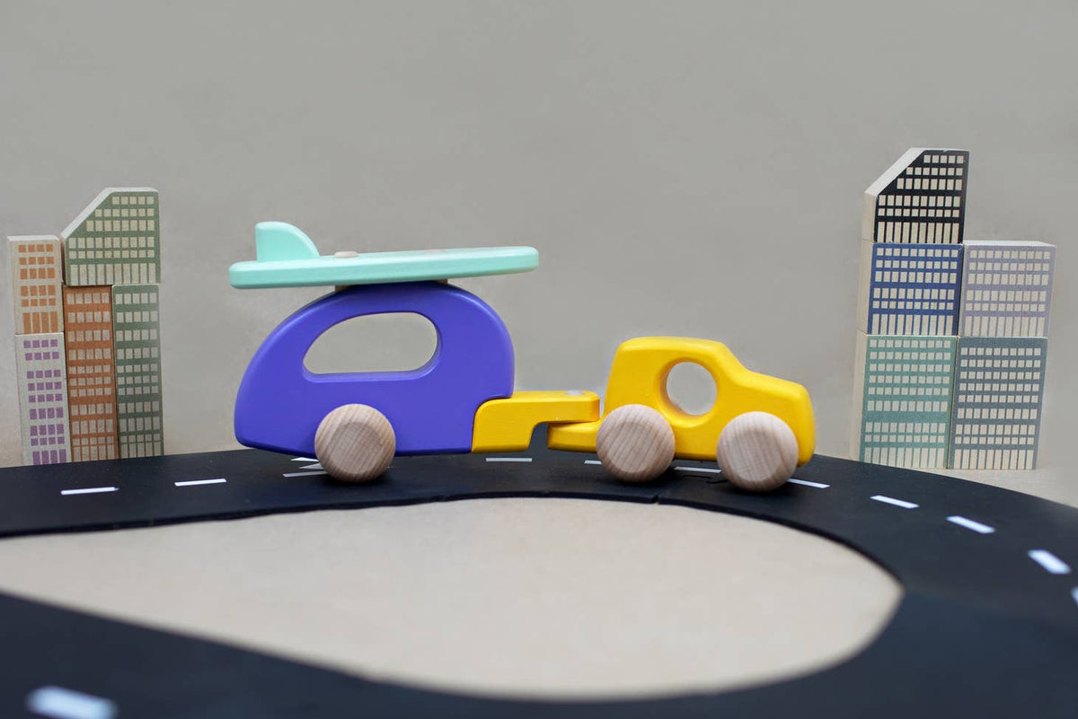 This wooden car with camper and surf board push toy is a great way to teach children about movement, speed, forces and will bring on communication skills too through inspiring imaginative play.