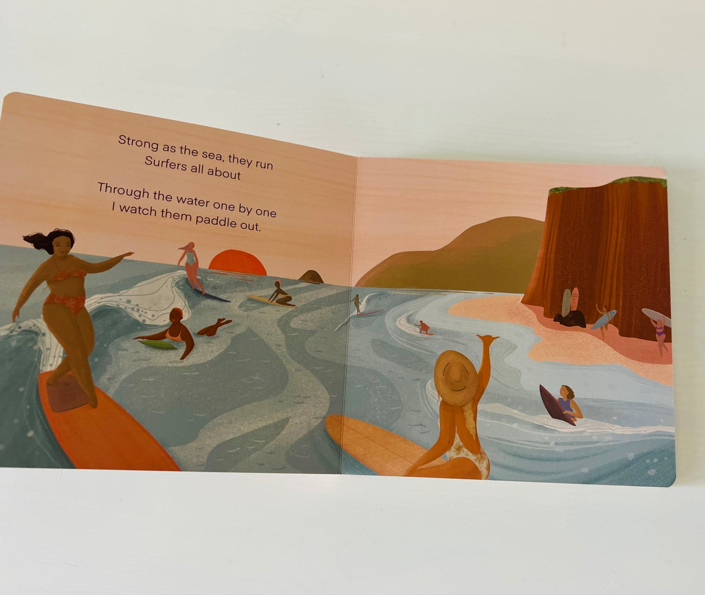 Experience a day at the beach through the eyes of a small child. Observe the friendship and love of sport displayed by everyday female athletes. This 8x8 inch board book was created in Vancouver BC and Encinitas CA. Perfect gift for beach lovers, new moms, baby showers or the little athlete in your life.