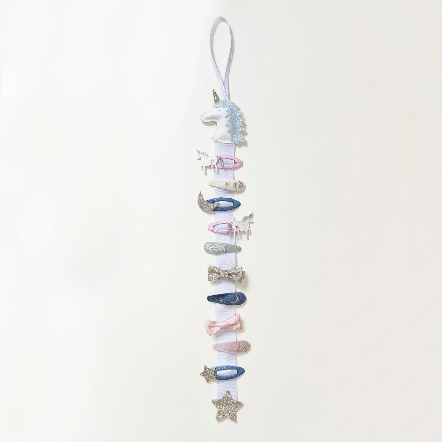 rockahula clip hanger unicorn / The perfect solution to storing and organizing hair clips in one place - included is a hanging loop that can be hung on a door or wall hook. Simply snap on your clips ready to wear again next time!
