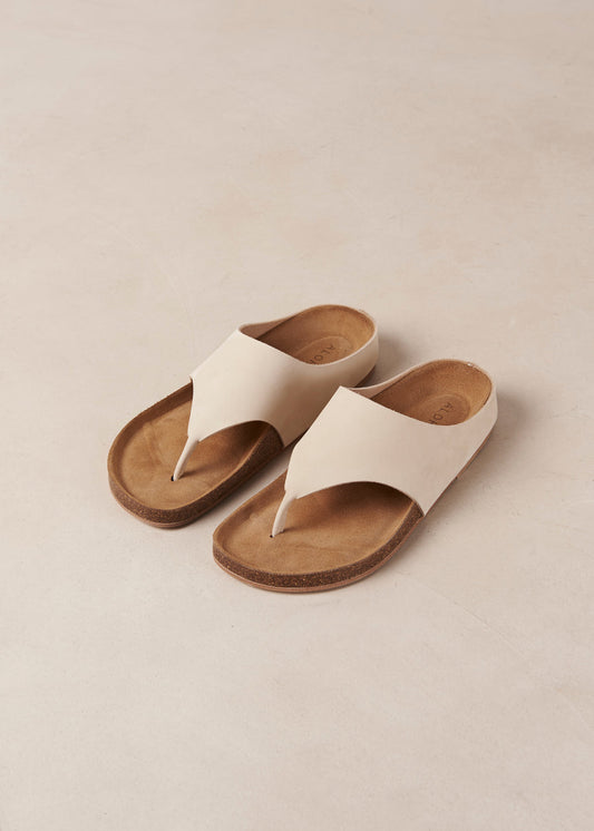 The Ivy is a thong sandal crafted from cream nubuck leather with wide straps and molded insoles. From day duties to casual evening events, this minimalist style is one for all-day wear. And thanks to its soft footbeds, you know the comfort is guaranteed. Sustainably made in Spain.