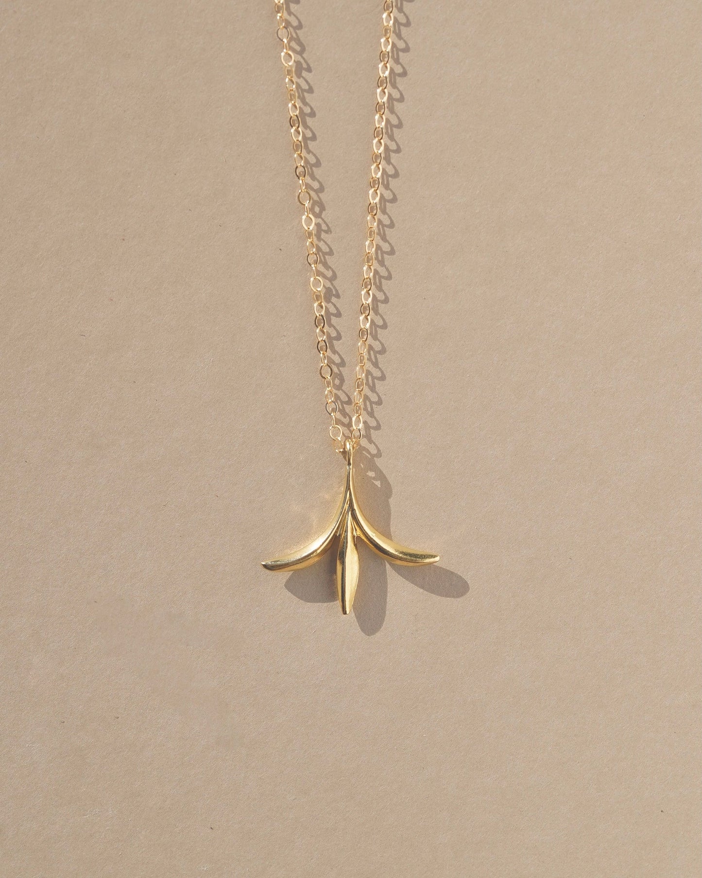 Delicate botanical enchanted pendant inspired by forest folklore and the seeds of the Calocedrus decurrens - California Incense Cedar tree. Handmade in the Santa Cruz Mountains.