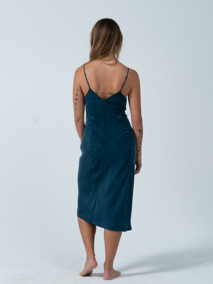 The Chelsea slip dress is here to honor your femme side with its flattering shape. Or don't, and grunge it down with some chunky boots and a vintage tee, how ever you want to wear it we think you'll look like great in this dress. Designed in Byron Bay, Australia.
