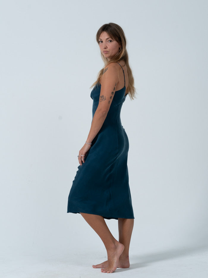 The Chelsea slip dress is here to honor your femme side with its flattering shape. Or don't, and grunge it down with some chunky boots and a vintage tee, how ever you want to wear it we think you'll look like great in this dress. Designed in Byron Bay, Australia.
