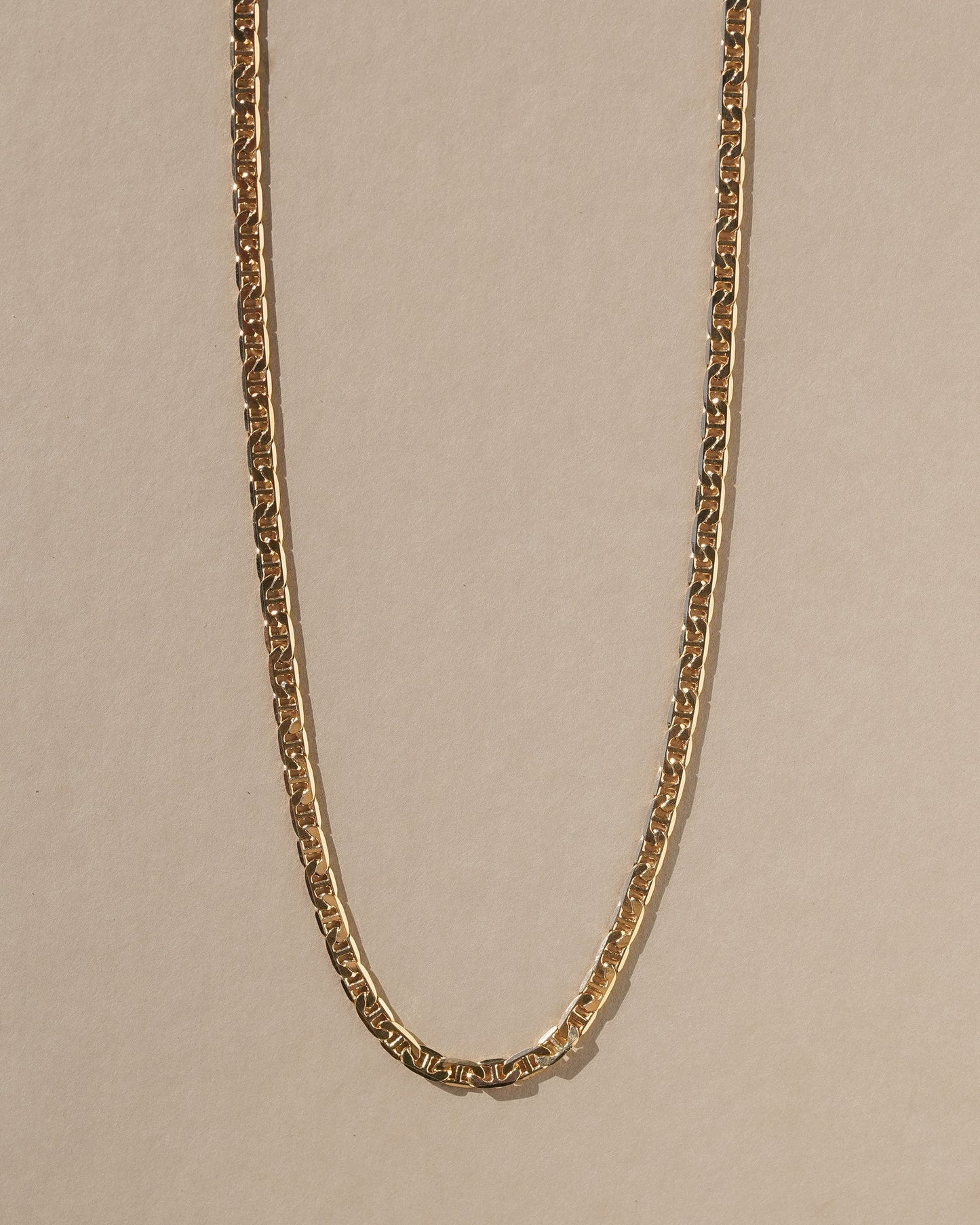 A simple braided chain intended to provide a ring of protection and luck when worn. 18k gold filled chain. Handmade in the Santa Cruz Mountains.