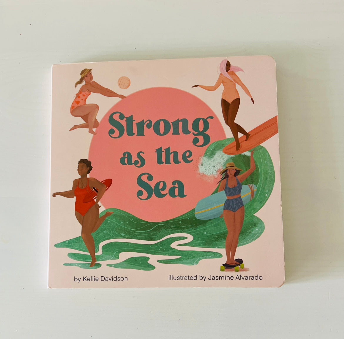Experience a day at the beach through the eyes of a small child. Observe the friendship and love of sport displayed by everyday female athletes. This 8x8 inch board book was created in Vancouver BC and Encinitas CA. Perfect gift for beach lovers, new moms, baby showers or the little athlete in your life.