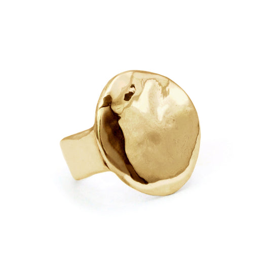 Crafted meticulously in shimmering bronze or sterling silver, with a watery finish, this ring makes a bold statement, both in weight and appearance, inviting wearers to embrace their inner strength and intuition. Handmade in Santa Cruz by Amanda Hunt.