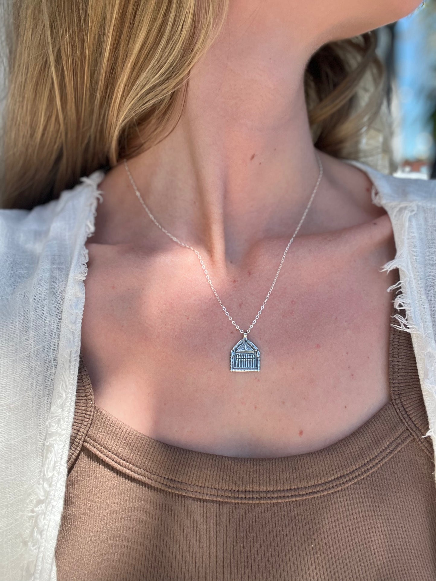 Delicate light weight hand carved charm necklace designed to represent a door, passageway or opportunity. Recycled brass pendant coated in a thick layer of high grade 14k gold or sterling silver. Handmade in the Santa Cruz Mountains.