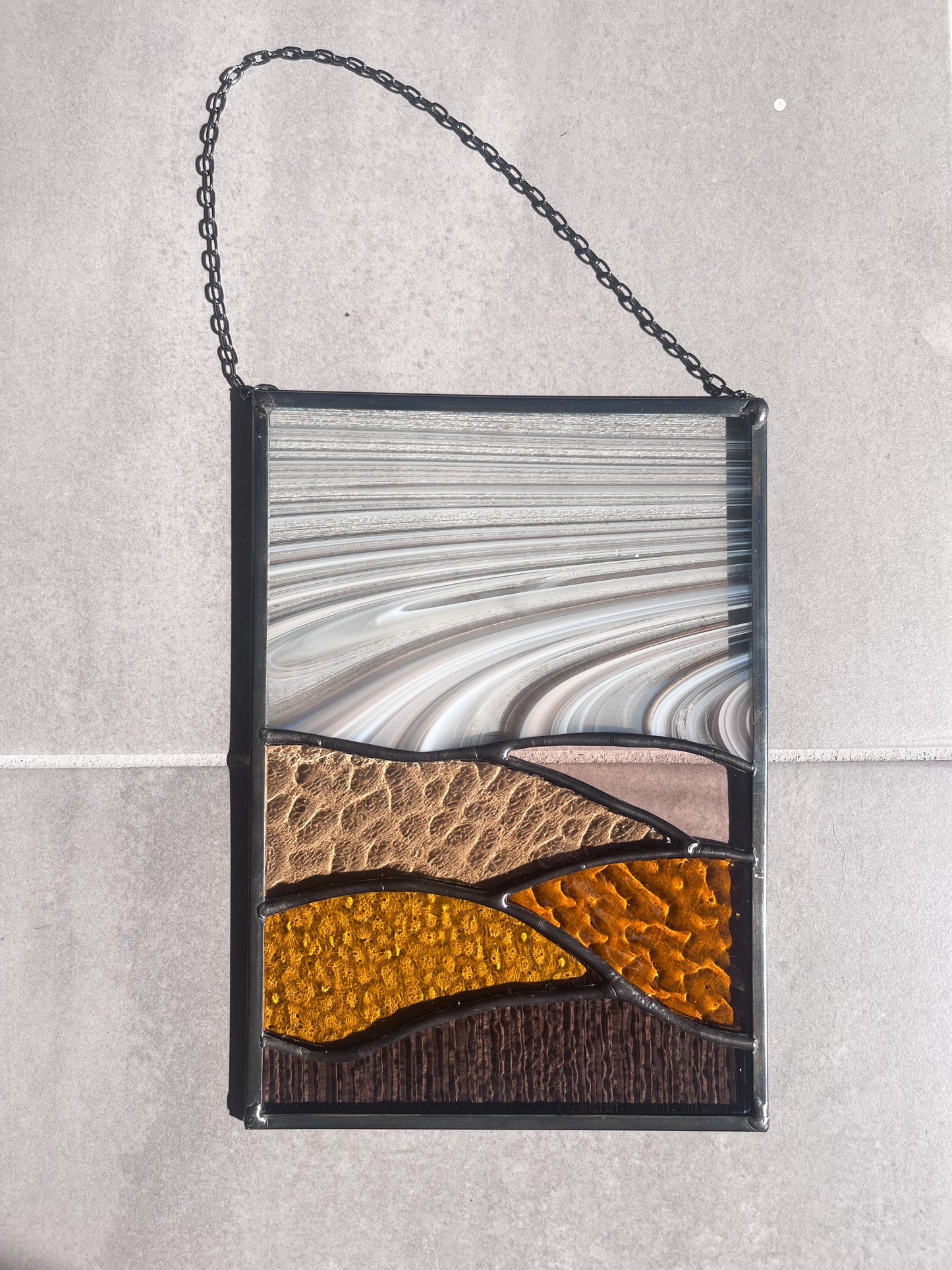 Handmade stained glass pendant with three elements attached by a silver chain. You can hang this panel in a window, on the wall as decor or even an outside patio. Custom made for Thread Spun by Culotta Creations.