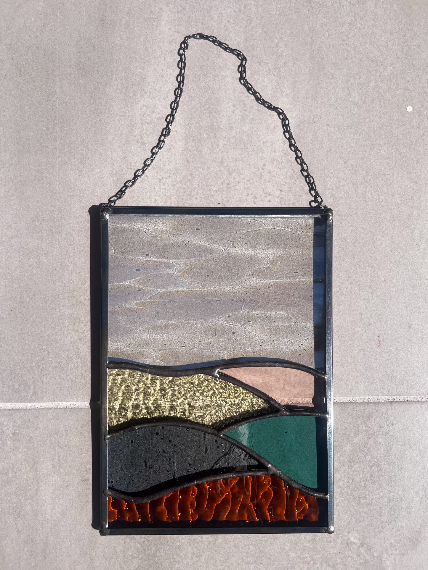 Handmade stained glass pendant with three elements attached by a silver chain. You can hang this panel in a window, on the wall as decor or even an outside patio. Custom made for Thread Spun by Culotta Creations.