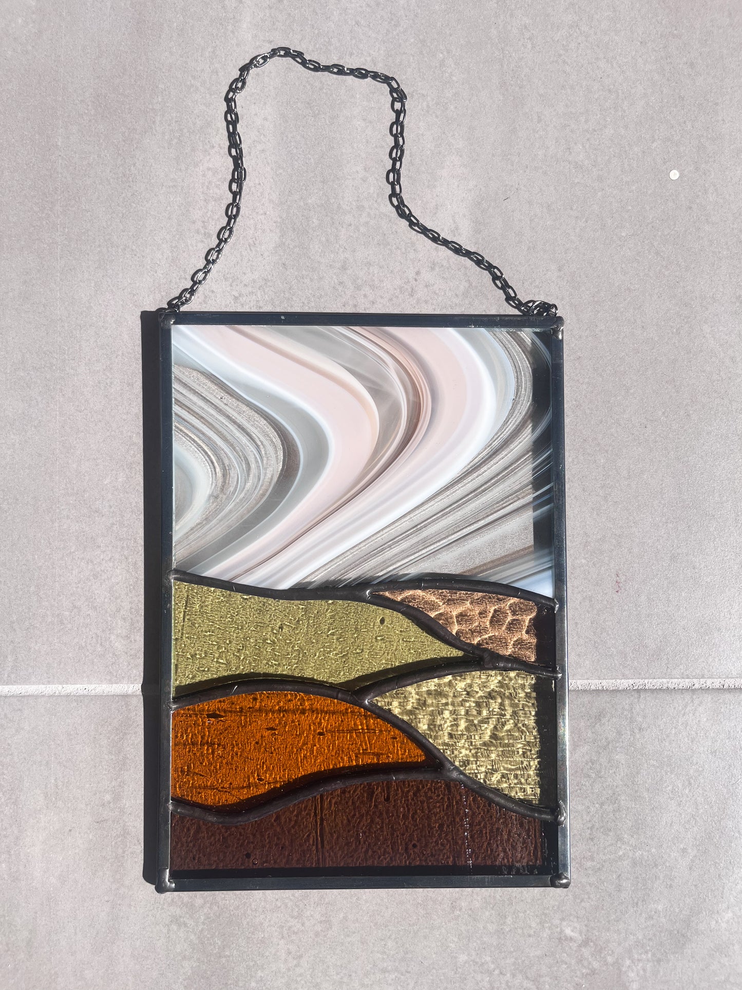 Handmade stained glass pendant with three elements attached by a silver chain. You can hang this panel in a window, on the wall as decor or even an outside patio. Custom made for Thread Spun by Culotta Creations.