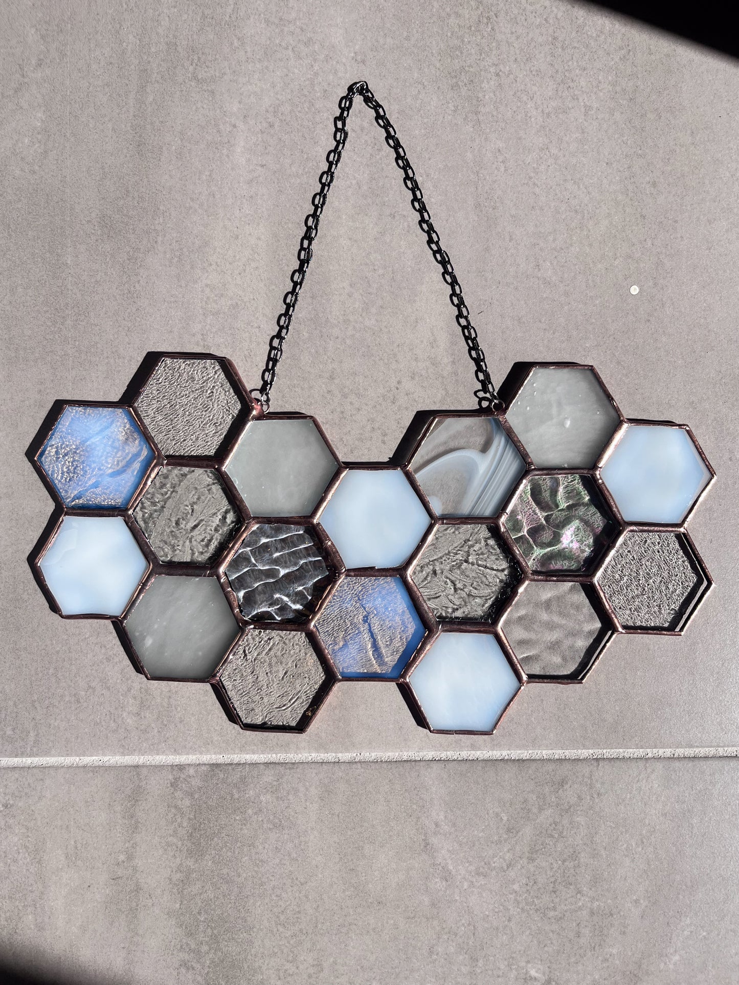 Handmade stained glass pendant with three elements attached by a silver chain. You can hang this panel in a window, on the wall as decor or even an outside patio. Custom made for Thread Spun by Culotta Creations.