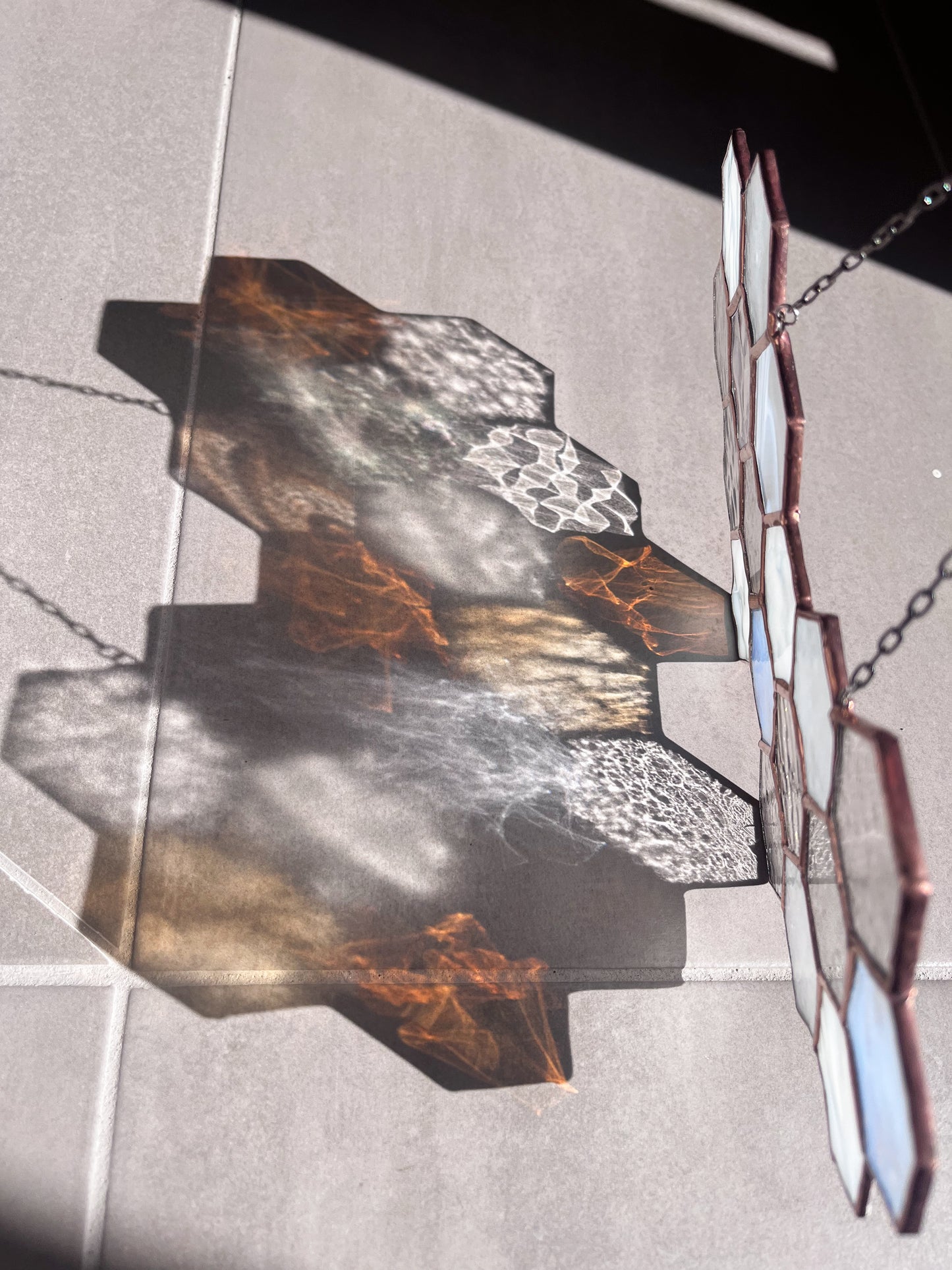 Handmade stained glass pendant with three elements attached by a silver chain. You can hang this panel in a window, on the wall as decor or even an outside patio. Custom made for Thread Spun by Culotta Creations.