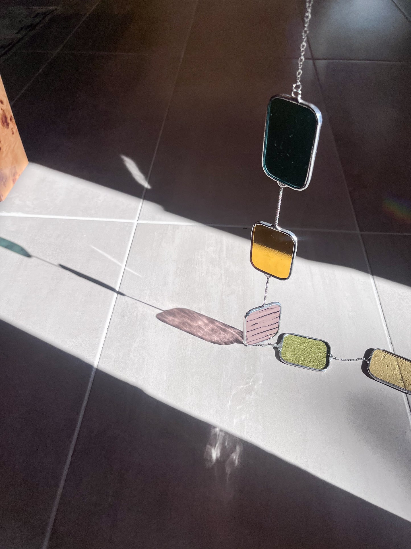 Handmade stained glass pendant with three elements attached by a silver chain. You can hang this panel in a window, on the wall as decor or even an outside patio. Custom made for Thread Spun by Culotta Creations.