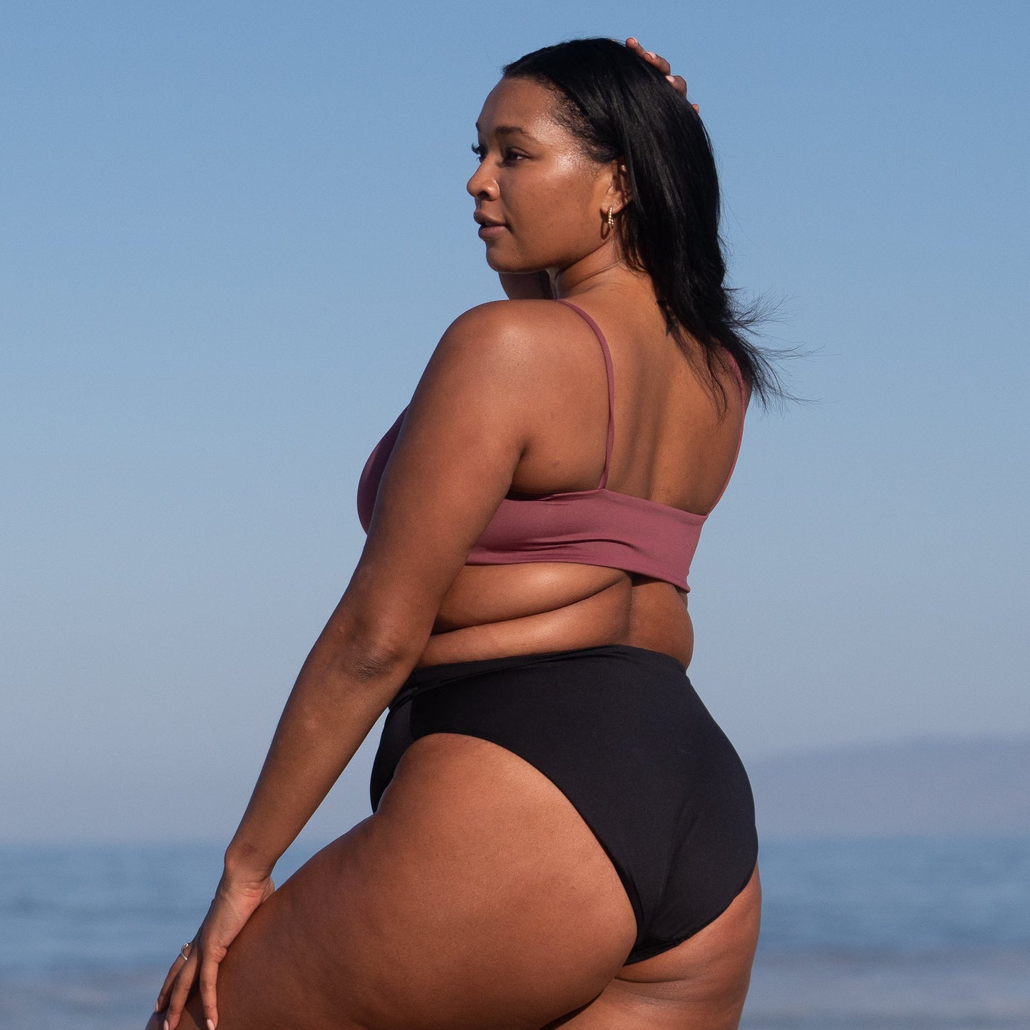 Is it a swim top? Is it a surf top? Is it a sports bra? Is it the best ever? Yes to all of the above. A scoop front, medium coverage bikini top built for smaller busts (A-C cup). One of Left on Friday's best selling tops, for good reason, with its insanely soft, smoothing coverage fabric.