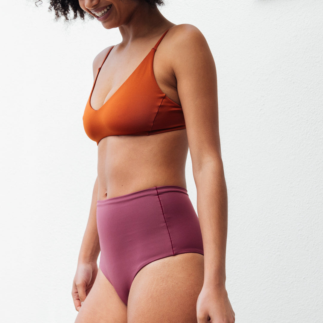 Dive in - these lux bottoms hug you in, while still showing just enough cheek to turn heads. A high waisted swimsuit bottom with a medium cut leg and medium bum coverage. One of Left on Friday's best selling bottoms, for good reason, with its insanely soft, smoothing coverage fabric.