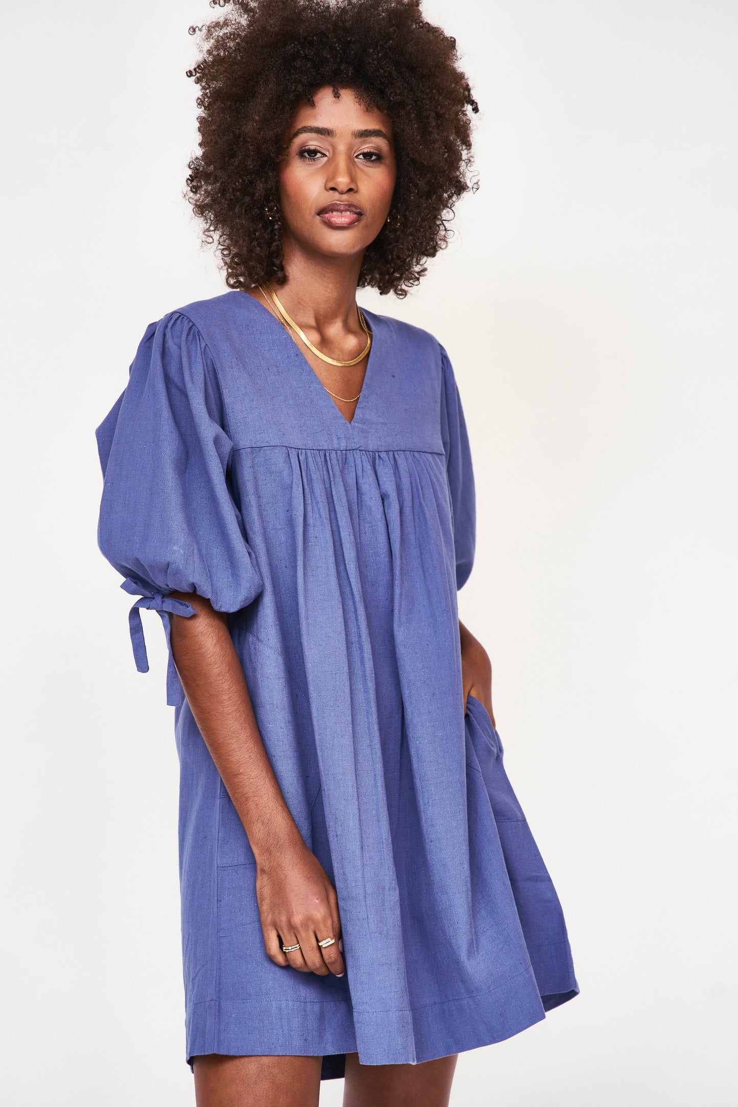 An easy, pullover style dress with a relaxed fit, made with 100% cotton that's hand loomed to give it a linen feel. Ethically made in India.