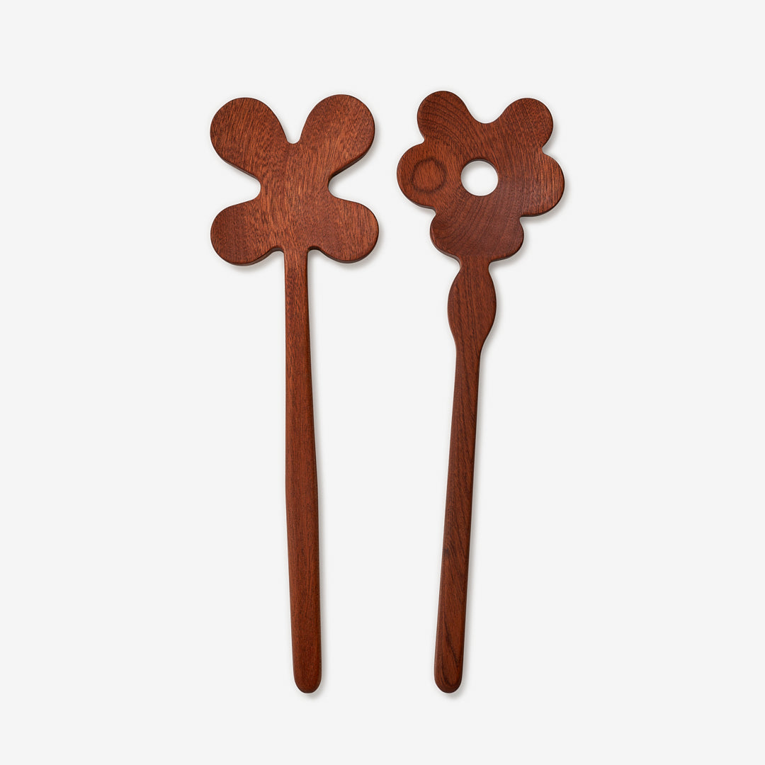 Whoever said food isn’t to be played with hasn’t met Serving Friends. These wooden spoons, carved into charming shapes, bring joy and humor to your dining table. made with sapele wood.