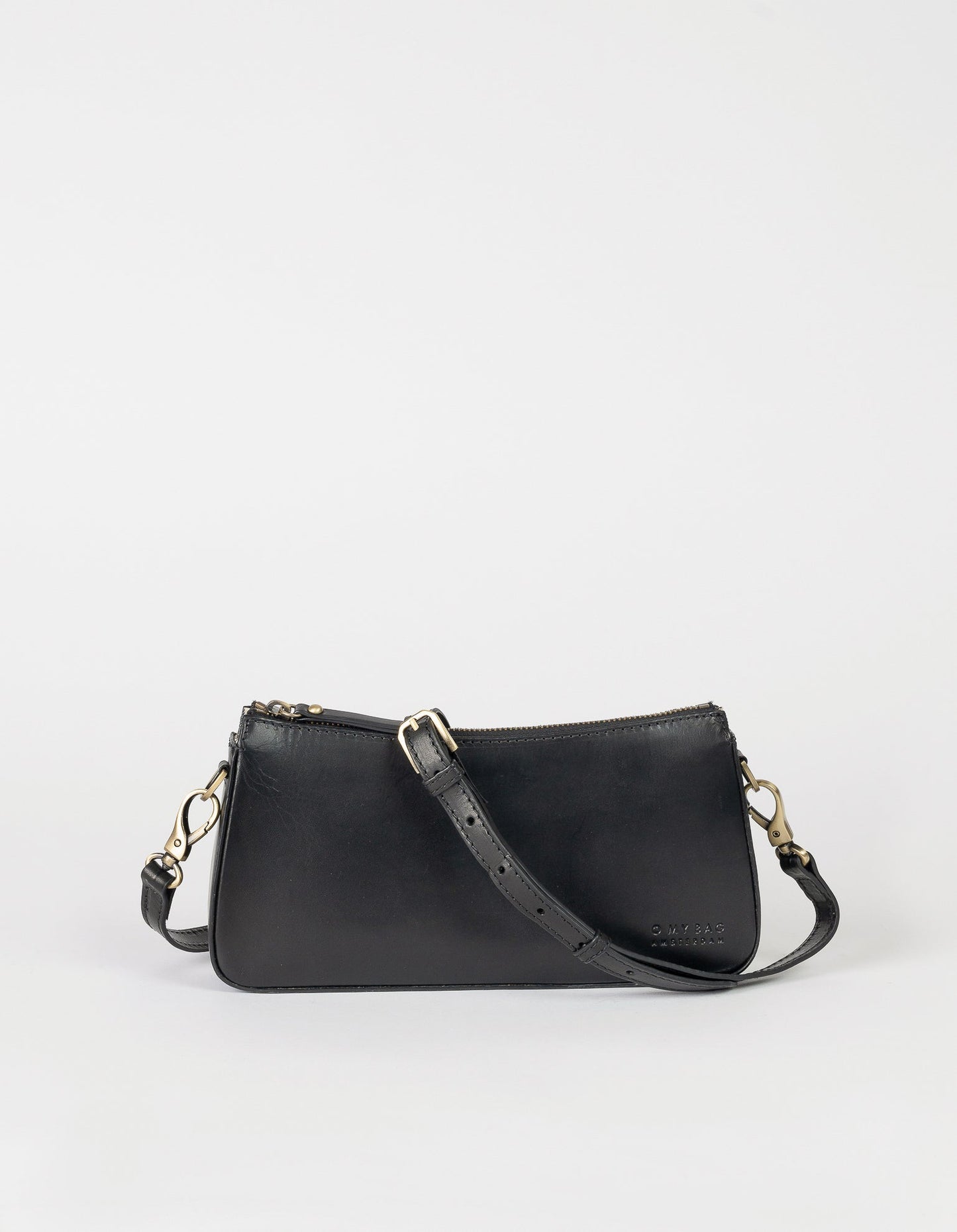 A bag that gives you an irreplaceable look and feel of a fun night out? Here she is! Small but mighty, Taylor has a compact and convenient design optimized to fit your most important belongings. She comes with one short strap and one long adjustable strap for a crossbody look. Made in India.