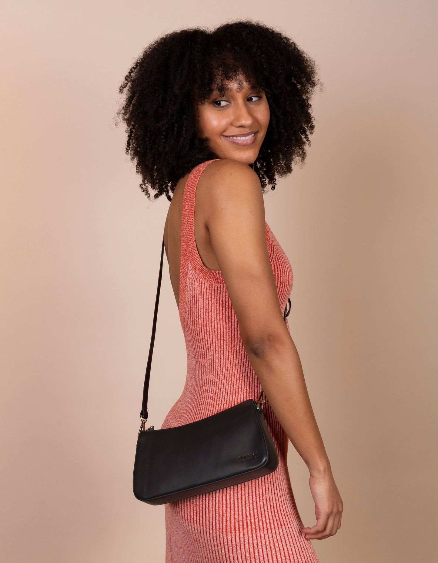 A bag that gives you an irreplaceable look and feel of a fun night out? Here she is! Small but mighty, Taylor has a compact and convenient design optimized to fit your most important belongings. She comes with one short strap and one long adjustable strap for a crossbody look. Made in India.