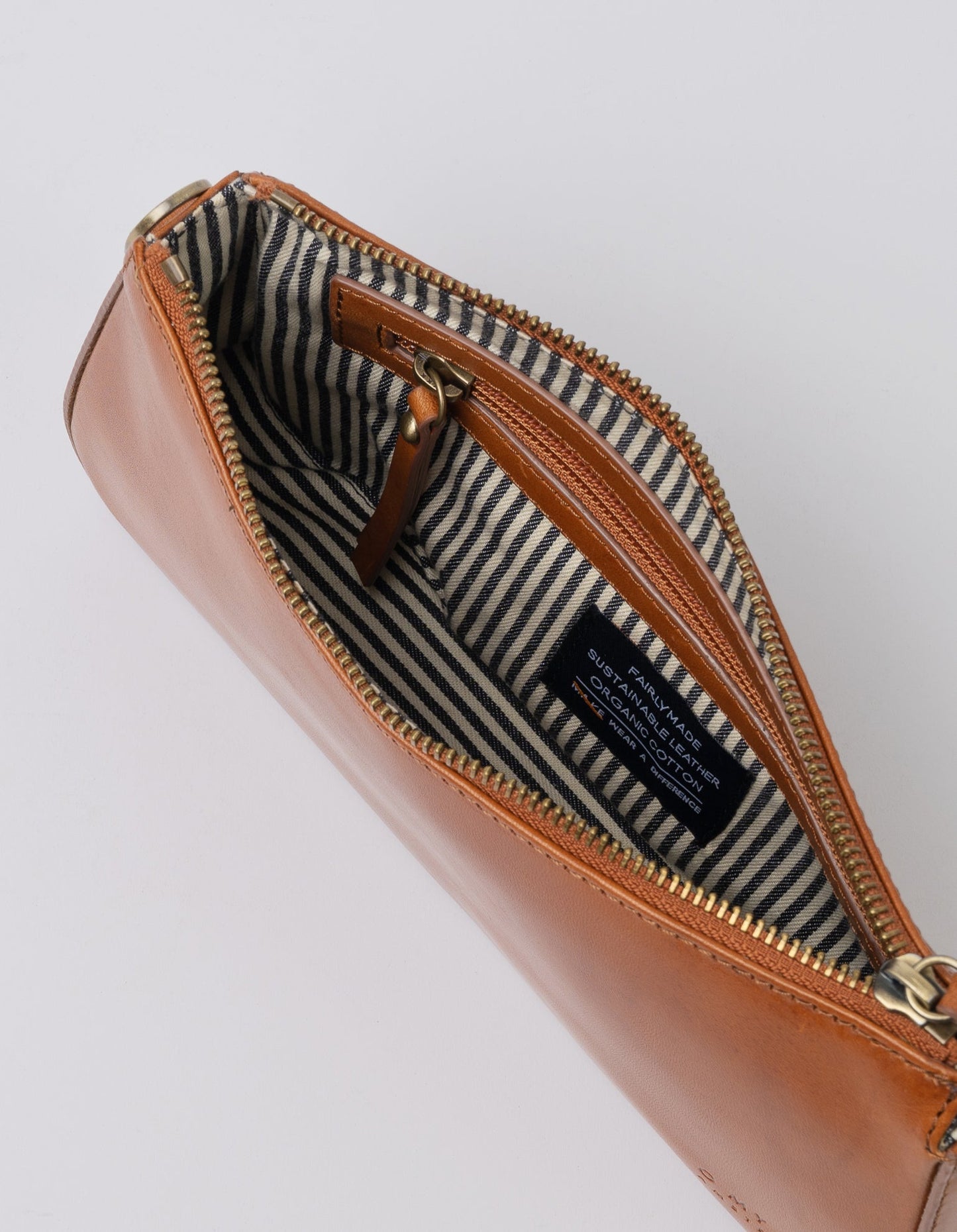 A bag that gives you an irreplaceable look and feel of a fun night out? Here she is! Small but mighty, Taylor has a compact and convenient design optimized to fit your most important belongings. She comes with one short strap and one long adjustable strap for a crossbody look. Made in India.