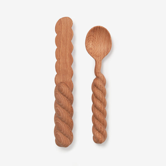 This wooden knife and spoon spread set welcomes whimsy to your morning toast, PB&J sandwiches, and midnight snacks. Break them out at a party to accompany dips and cheese boards. Boasting a delightfully chubby, twisted form, they are likely to be the cutest thing in your kitchen. made with beech wood.