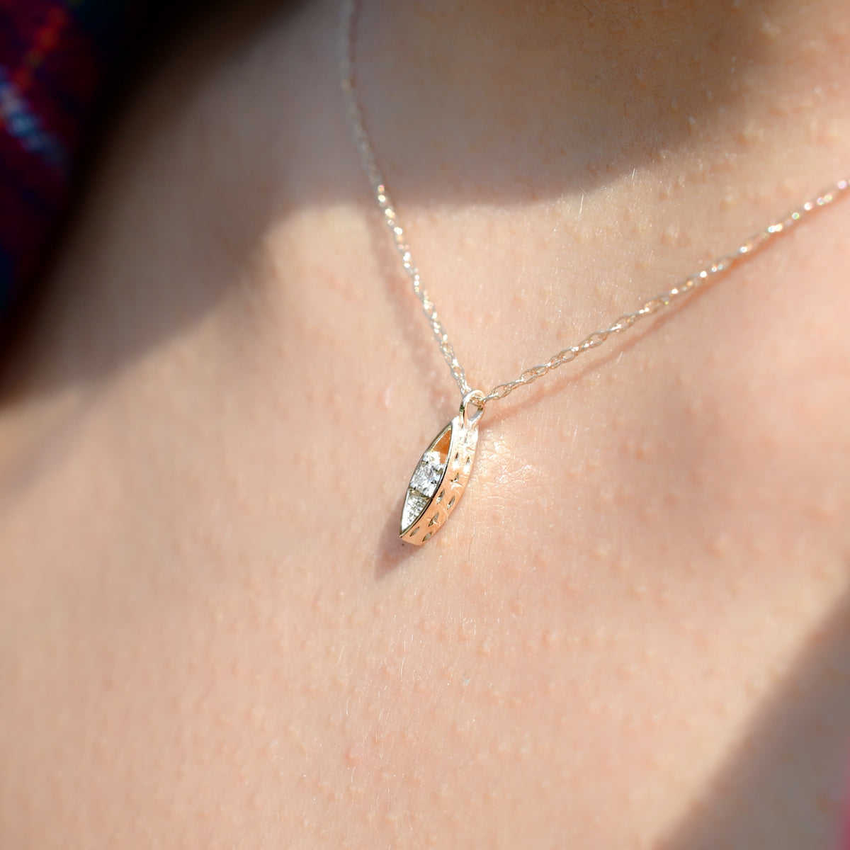 Solid 14k yellow gold pendant, chain, and clasp featuring a white diamond and a hand engraved star detail. Each Miarante piece is carefully handcrafted in Chicago by a skilled production team.