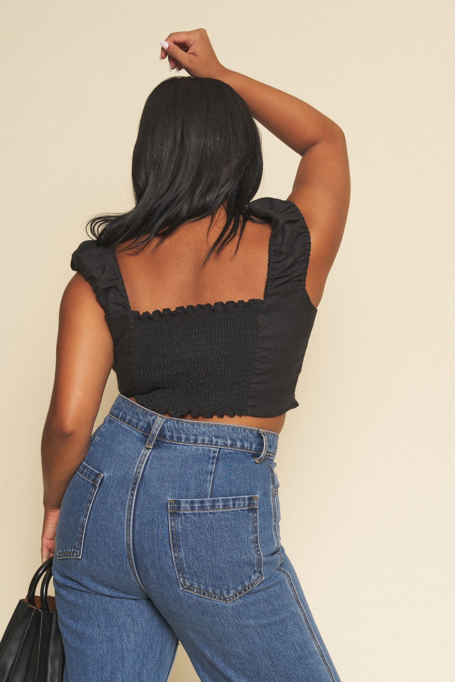 Whimsy + Row Flora Pants in Dark Denim. High rise, wide leg pant with a chunky button - what more could you ask for? This classic pair of jeans is also made from 100% organic cotton. Ethically and sustainably-made for every season.