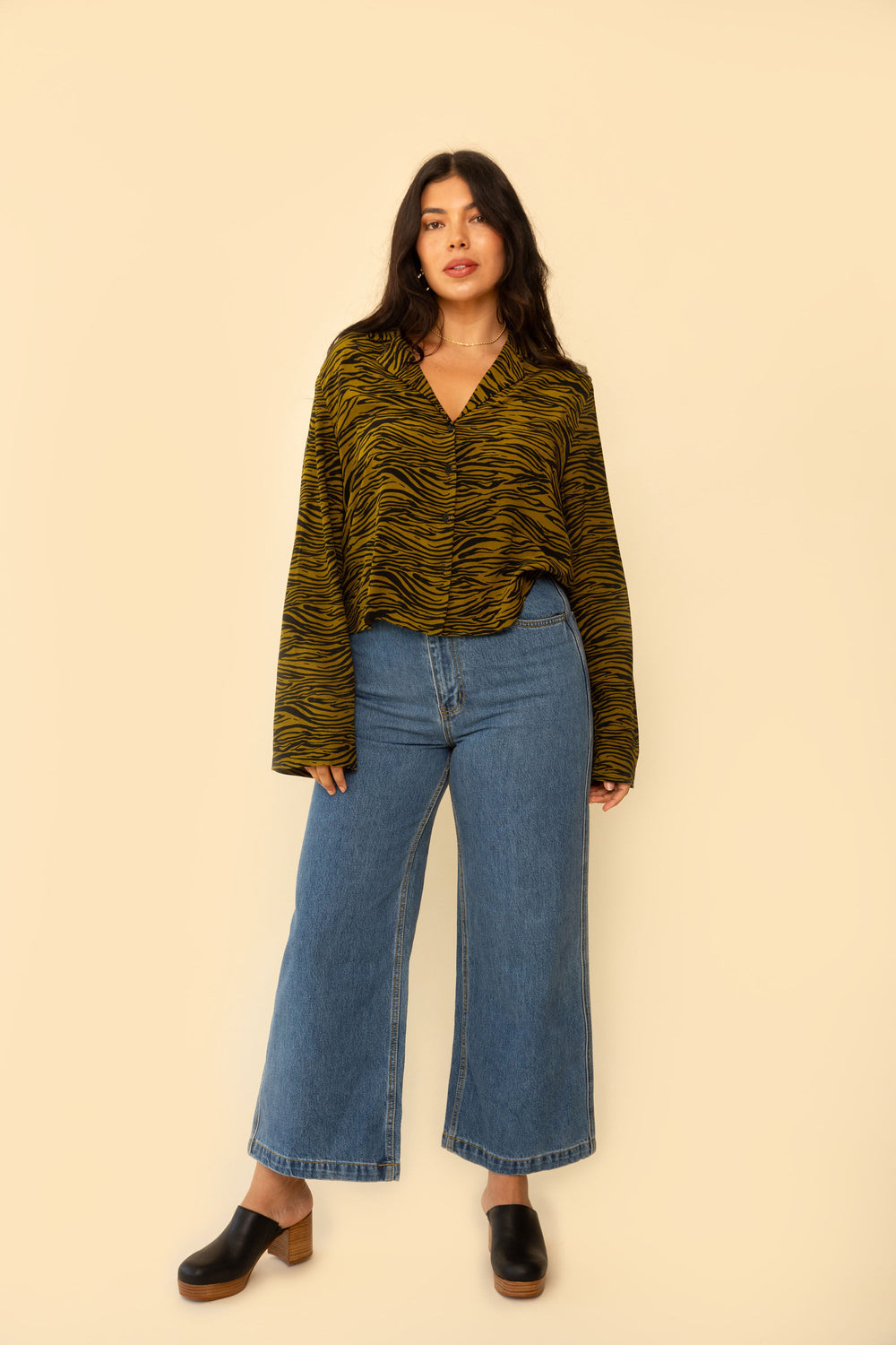 Whimsy + Row Flora Pants in Dark Denim. High rise, wide leg pant with a chunky button - what more could you ask for? This classic pair of jeans is also made from 100% organic cotton. Ethically and sustainably-made for every season.